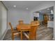 Dining area featuring a wooden table and chairs adjacent to the kitchen area at 2430 Florentine Way # 44, Clearwater, FL 33763