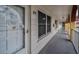 Exterior hallway with unit doors and white railings at 2430 Florentine Way # 44, Clearwater, FL 33763