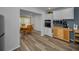 Kitchen with stainless steel appliances and a dining area with a wooden table and chairs at 2430 Florentine Way # 44, Clearwater, FL 33763