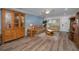 Comfortable living room with neutral walls and wood-look floors at 2430 Florentine Way # 44, Clearwater, FL 33763