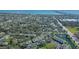 Overhead shot of the community set by a pond and showcasing its proximity to the ocean and local highways at 3001 58Th S Ave # 312, St Petersburg, FL 33712