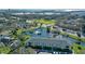 Beautiful aerial view of a lakeside apartment building featuring palm trees and meticulously maintained landscaping at 3001 58Th S Ave # 312, St Petersburg, FL 33712