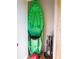 Storage closet with a green kayak and golf trolley at 3001 58Th S Ave # 312, St Petersburg, FL 33712