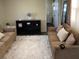 Cozy living room featuring plush seating and soft, inviting decor at 36416 Cordova Cir, Zephyrhills, FL 33541