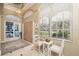 Bright and airy foyer with high ceilings, transom windows and tile flooring at 4906 Turtle Creek Trl, Oldsmar, FL 34677
