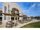 Beautiful outdoor seating area with umbrellas and a view of the surrounding landscape at 4906 Turtle Creek Trl, Oldsmar, FL 34677