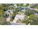 A beautifully landscaped property with canal access and a private boat dock at 4907 W Spring Lake Dr, Tampa, FL 33629