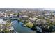 Picturesque neighborhood with waterfront homes, private docks, and lush landscaping at 4907 W Spring Lake Dr, Tampa, FL 33629