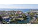 Waterfront community featuring luxurious homes and boat docks along picturesque canals leading to the open bay at 4907 W Spring Lake Dr, Tampa, FL 33629