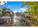 Private dock with boat lift offers direct access to the water for boating and recreation at 4911 W Melrose S Ave, Tampa, FL 33629