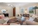 Relaxing living room with stylish furniture, elegant décor, and lots of natural light at 4911 W Melrose S Ave, Tampa, FL 33629