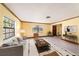Inviting living room featuring cozy seating, natural light, and stylish decor at 5105 W Cleveland St, Tampa, FL 33609