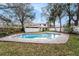 Beautiful in-ground pool with a large deck perfect for relaxation and entertaining at 5105 W Cleveland St, Tampa, FL 33609