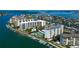 Gorgeous waterfront condo community with a pool, tennis courts, boat docks, and bay and gulf views at 660 Island Way # 202, Clearwater Beach, FL 33767
