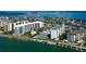 Stunning condo community with boat access, pool, tennis, and waterfront views, blending luxury and recreation at 660 Island Way # 202, Clearwater Beach, FL 33767