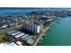 Gorgeous condo complex with pool, tennis courts, boat docks, bay and gulf views, and city skyline at 660 Island Way # 202, Clearwater Beach, FL 33767