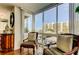 Relaxing balcony with comfortable chairs and scenic views of the surrounding area at 660 Island Way # 202, Clearwater Beach, FL 33767