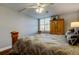 Bedroom with natural light coming through the window and hardwood flooring at 660 Island Way # 202, Clearwater Beach, FL 33767