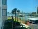 Enjoy views from the condo of the intercoastal waterway, tennis courts, parking, and beautiful landscaping at 660 Island Way # 202, Clearwater Beach, FL 33767