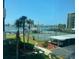 Enjoy views from the condo of the intercoastal waterway, tennis courts, parking, and beautiful landscaping at 660 Island Way # 202, Clearwater Beach, FL 33767