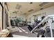 Spacious gym with weight training equipment, mirrors, and ample natural light at 660 Island Way # 202, Clearwater Beach, FL 33767