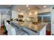 Kitchen featuring stainless steel appliances, granite counters and breakfast bar with seating at 660 Island Way # 202, Clearwater Beach, FL 33767