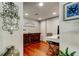 Office area with hardwood floors and a decorative wall hanging at 660 Island Way # 202, Clearwater Beach, FL 33767