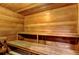 Inviting sauna with wood paneled walls, wooden benches, and a relaxing atmosphere at 660 Island Way # 202, Clearwater Beach, FL 33767