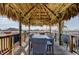 Spacious tiki hut with dining table offering marina views at 660 Island Way # 202, Clearwater Beach, FL 33767
