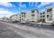 Apartment building exterior with parking and handicapped accessible entrance at 6916 Stones Throw N Cir # 9110, St Petersburg, FL 33710