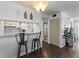 Eat-in kitchen features a breakfast bar with stools and views of bathroom at 6916 Stones Throw N Cir # 9110, St Petersburg, FL 33710