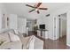 Cozy living room features hardwood floors, neutral decor, and an open layout at 6916 Stones Throw N Cir # 9110, St Petersburg, FL 33710