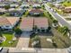 Beautiful single Gathering home with mature landscaping and a driveway at 701 Baltusrol Way, Sun City Center, FL 33573