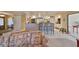 Open floor plan features a breakfast bar with a kitchen, Gathering room, and dining area at 701 Baltusrol Way, Sun City Center, FL 33573