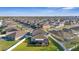 Aerial view of a neighborhood with houses and backyard with screened-in patio at 7112 Samuel Ivy Dr, Tampa, FL 33619