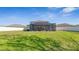 Expansive backyard featuring a screened-in patio and lush green grass at 7112 Samuel Ivy Dr, Tampa, FL 33619