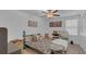 Cozy bedroom with a patterned bedspread, desk, and a comfortable teddy bear at 7112 Samuel Ivy Dr, Tampa, FL 33619