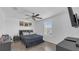 Modern bedroom showcasing a stylish black bed frame and streamlined furniture at 7112 Samuel Ivy Dr, Tampa, FL 33619
