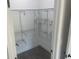 Well-organized walk-in closet with multiple shelves and rods for maximum storage efficiency at 8204 Chimney Rock Dr, Webster, FL 33597