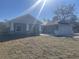 Charming single-story home with well-manicured lawn, garage, and covered front entryway at 8204 Chimney Rock Dr, Webster, FL 33597