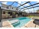 Screened pool and patio area with outdoor seating, bar and spa at 827 Timber Pond Dr, Brandon, FL 33510