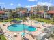 Gorgeous aerial view of condos, swimming pool, and jacuzzi at 851 Bayway Blvd # 904, Clearwater Beach, FL 33767
