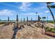 Outdoor area with tables, benches and grills overlooking the waterfront at 851 Bayway Blvd # 904, Clearwater Beach, FL 33767