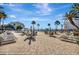Resort-style pool area with lounge chairs, tables and umbrellas at 851 Bayway Blvd # 904, Clearwater Beach, FL 33767
