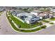 Stunning single-Gathering home boasts a private pool, manicured lawn, and elegant landscaping at 8721 Drummer Plank Dr, Wesley Chapel, FL 33545