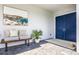 Inviting front porch with a cozy bench, decorative pillows, and tasteful decor creating a welcoming entry at 8721 Drummer Plank Dr, Wesley Chapel, FL 33545