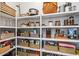 Well-organized pantry with ample shelving and storage solutions for efficient organization of goods at 8721 Drummer Plank Dr, Wesley Chapel, FL 33545