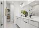 Sleek bathroom with dual sinks, modern vanity, and marble accents for a spa-like experience at 879 6Th S Ave, St Petersburg, FL 33701