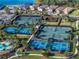 This community offers tennis courts, pickleball courts, and a playground near the pool and clubhouse at 10446 Highland Park Pl, Palmetto, FL 34221