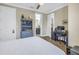 Inviting bedroom featuring a cozy bed, a workspace, and an ensuite bathroom at 10446 Highland Park Pl, Palmetto, FL 34221